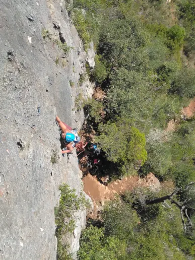 Climber leading one of the routes at Rocha da Pena, Portugal.